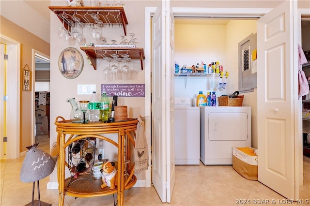 washroom featuring washer and clothes dryer