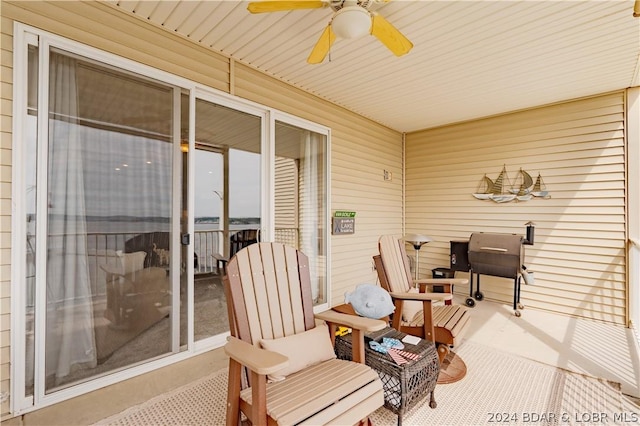 view of patio / terrace featuring ceiling fan