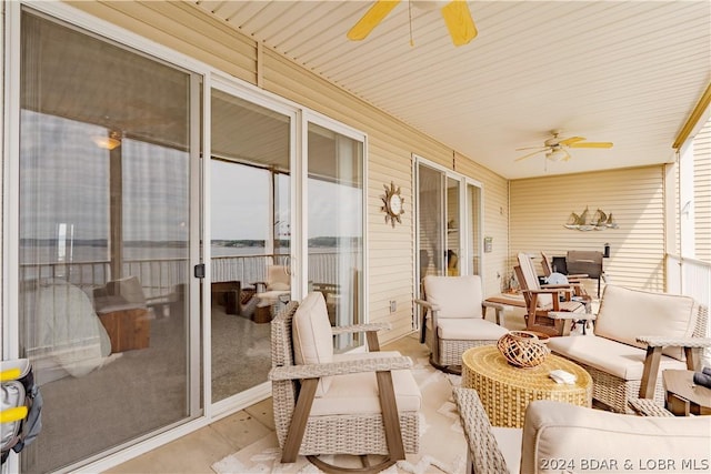 sunroom with ceiling fan and a wealth of natural light