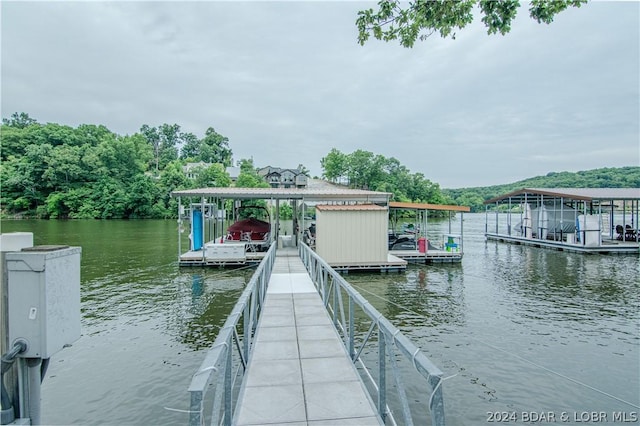 dock area featuring a water view