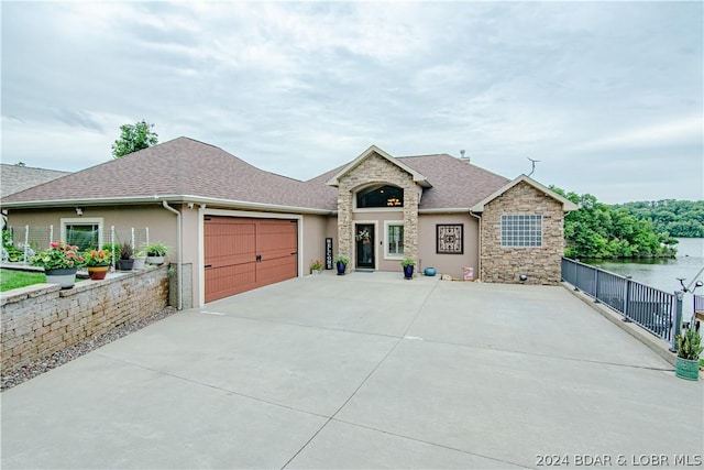 view of front of property with a garage