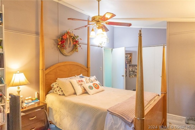 bedroom featuring ceiling fan and ornamental molding