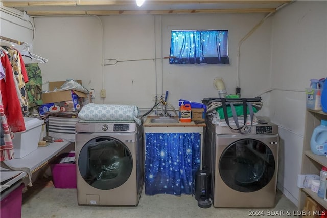 laundry area with washer / dryer