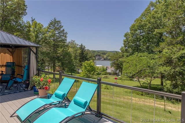 wooden deck with a yard