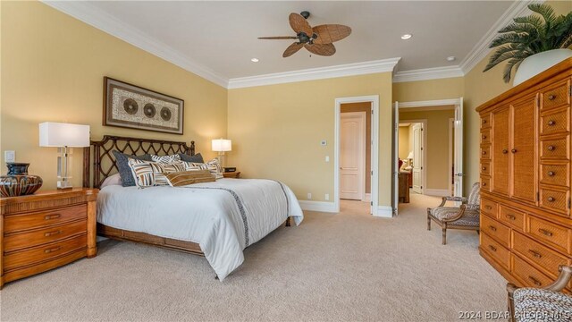 carpeted bedroom with ceiling fan and crown molding