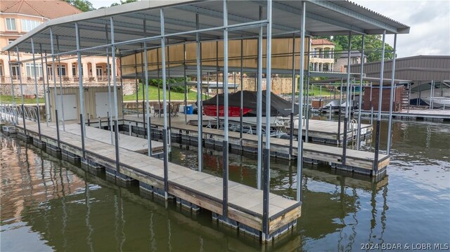 view of dock with a water view