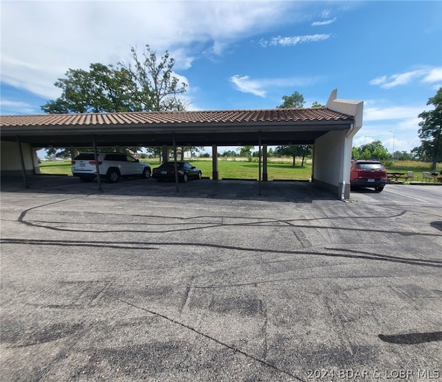 view of car parking featuring a carport