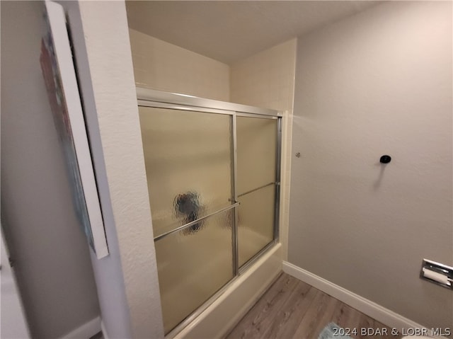 bathroom with wood-type flooring