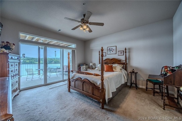 bedroom with ceiling fan, access to outside, and light colored carpet