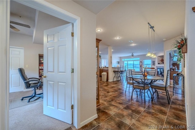 interior space featuring ceiling fan