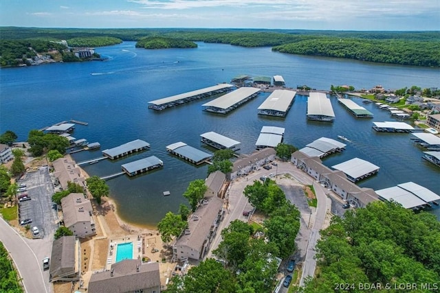 birds eye view of property featuring a water view