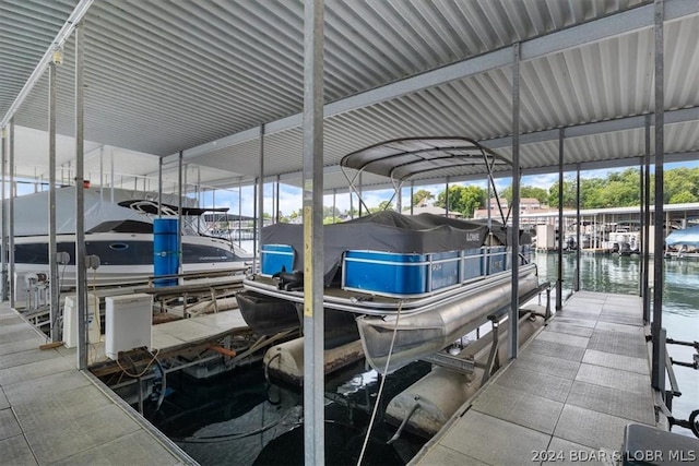 view of dock with a water view