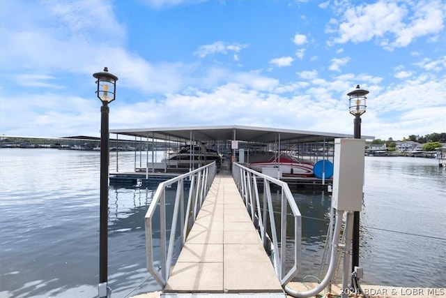 view of dock with a water view