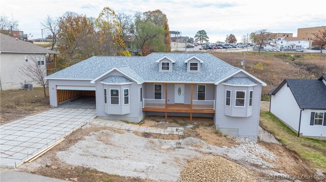 view of front of home featuring covered porch