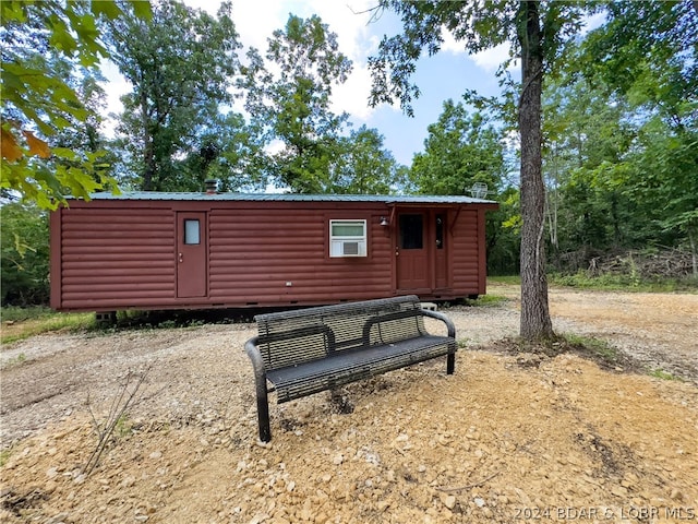 view of property's community with an outdoor structure