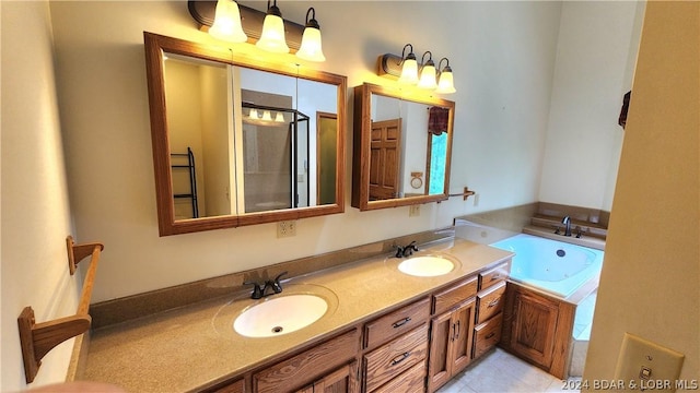 bathroom with vanity and shower with separate bathtub