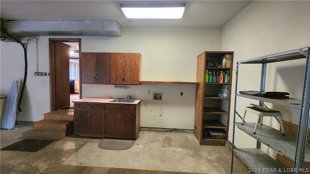 kitchen with sink and dark brown cabinets