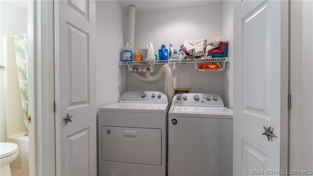 laundry area featuring separate washer and dryer