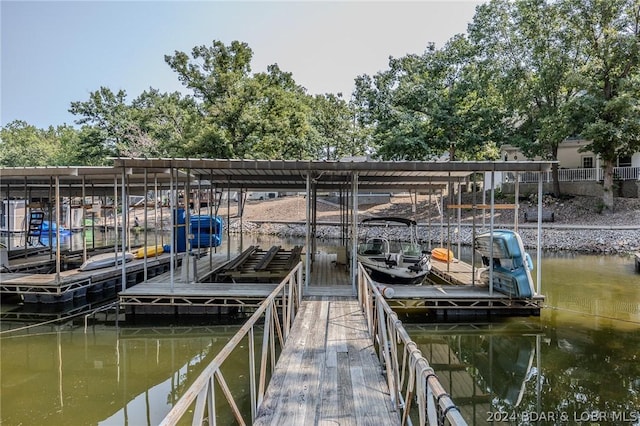 dock area featuring a water view