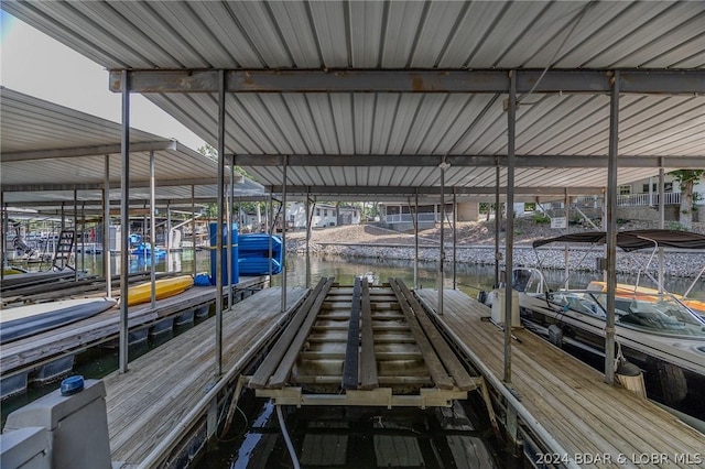 view of dock with a water view