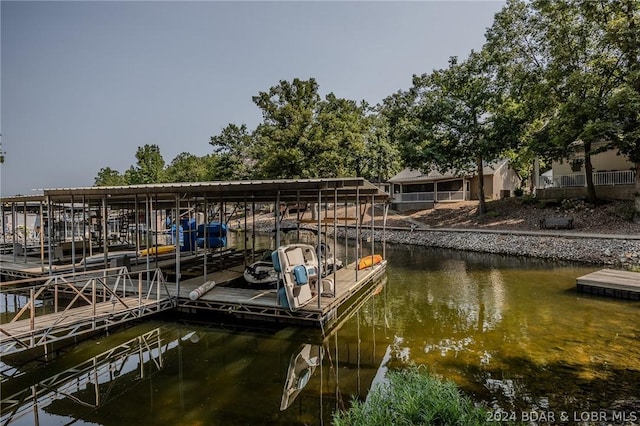 view of dock with a water view