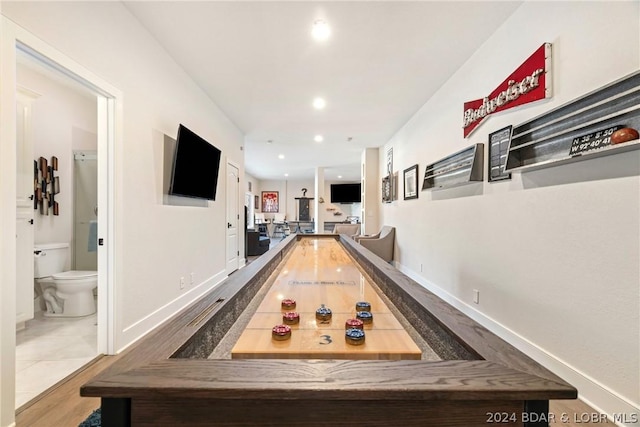 recreation room featuring light tile patterned floors