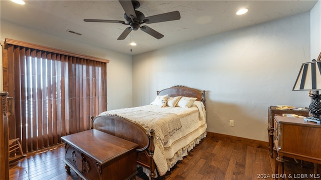 bedroom featuring dark hardwood / wood-style floors and ceiling fan