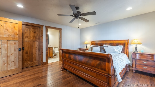 bedroom featuring ensuite bathroom, ceiling fan, and wood-type flooring