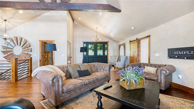 living room featuring beam ceiling, an inviting chandelier, a barn door, hardwood / wood-style floors, and high vaulted ceiling