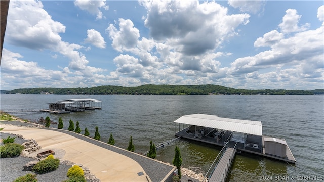 view of dock with a water view