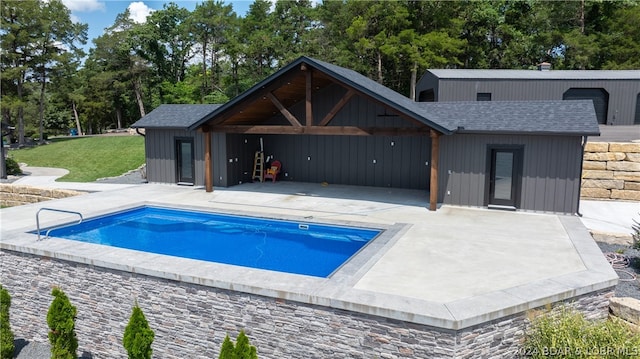 view of pool featuring a patio