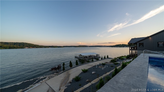 view of dock featuring a water view