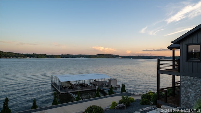 view of dock with a water view