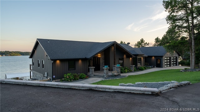 view of front facade featuring a water view