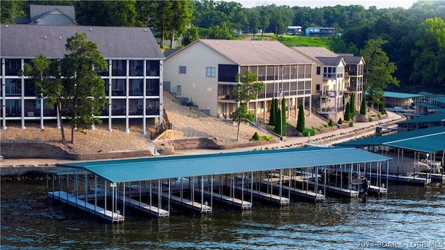 view of dock featuring a water view and boat lift