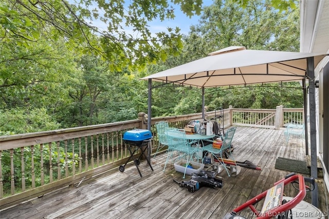 deck featuring a gazebo and grilling area