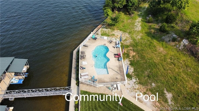 birds eye view of property featuring a water view