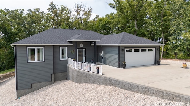 view of front of property featuring a garage