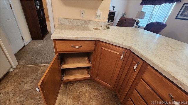 kitchen featuring carpet floors