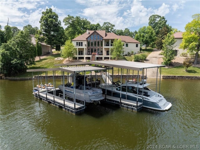 dock area with a water view