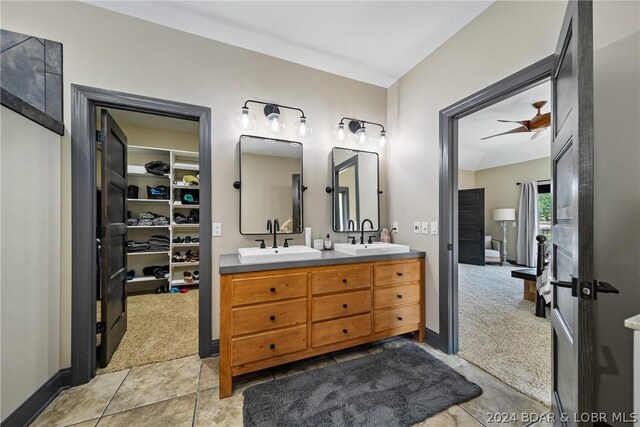 bathroom with vanity, tile patterned floors, and ceiling fan