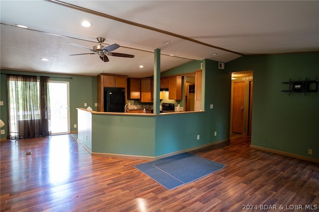 kitchen with ceiling fan, dark hardwood / wood-style flooring, kitchen peninsula, vaulted ceiling, and black appliances