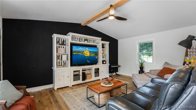 living room featuring vaulted ceiling with beams, wood-type flooring, and ceiling fan