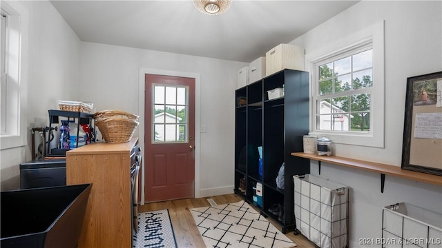 kitchen with wood counters and light hardwood / wood-style floors