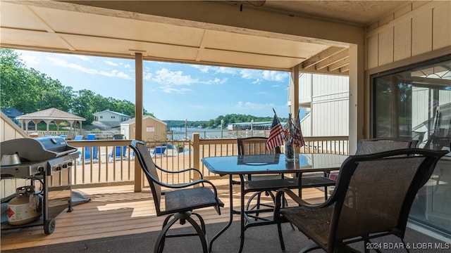 deck featuring a water view