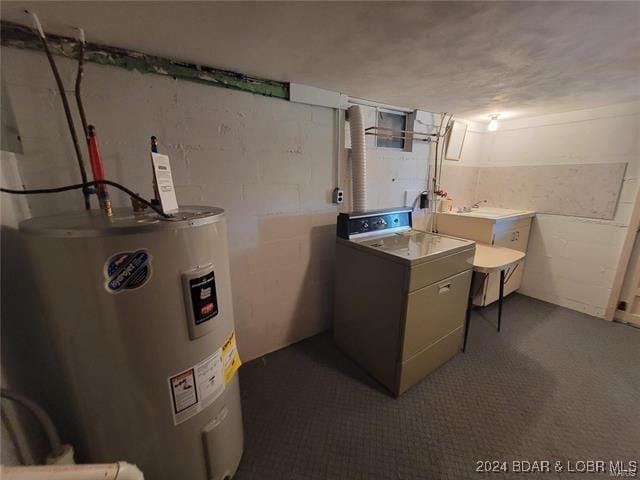 utility room with washer / dryer and electric water heater