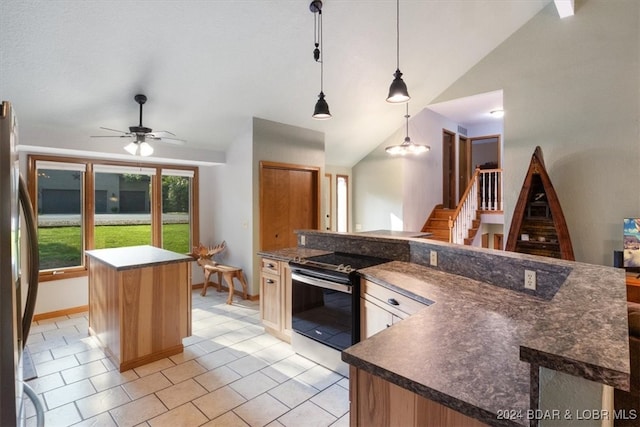 kitchen with pendant lighting, light tile patterned flooring, a center island, lofted ceiling, and stainless steel appliances