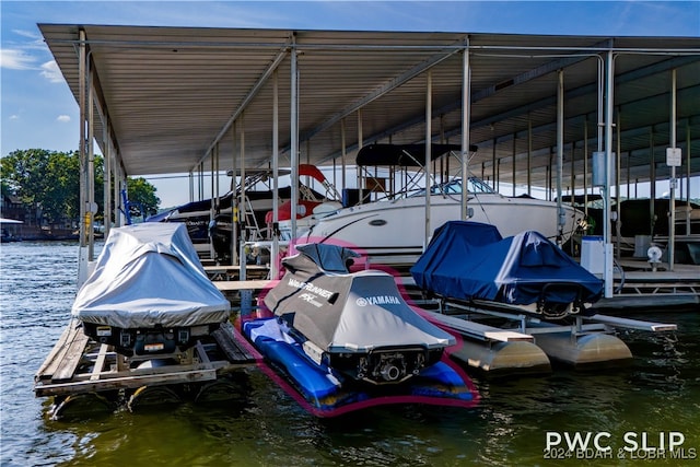 dock area featuring a water view