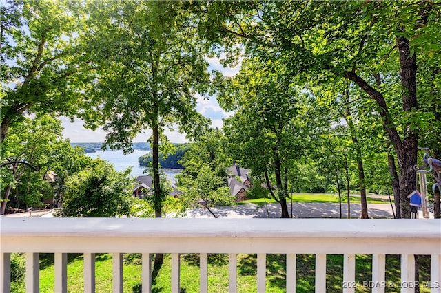 view of yard with a balcony