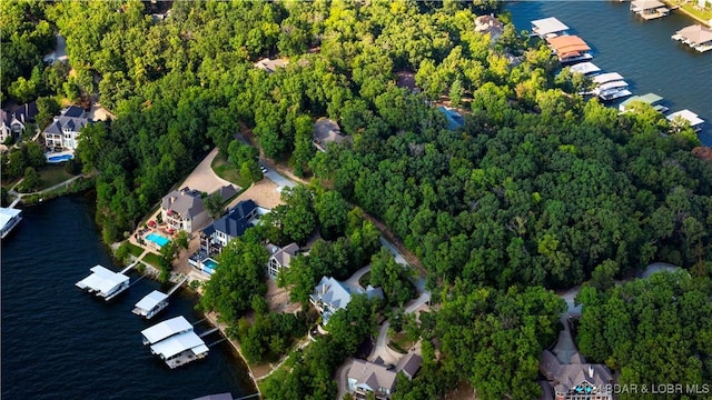 drone / aerial view featuring a water view and a residential view